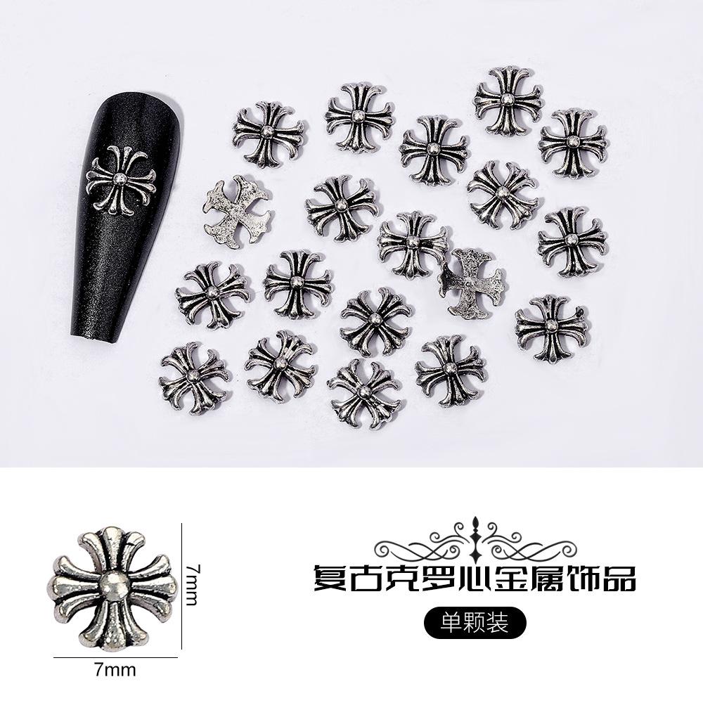 

Нейл-арт Ворон Серце Ювелірні вироби Вінтажна біжутерія Панк-стиль Хрест Армія Квітка Шестикутна Зірка Цвях Металеві Аксесуари