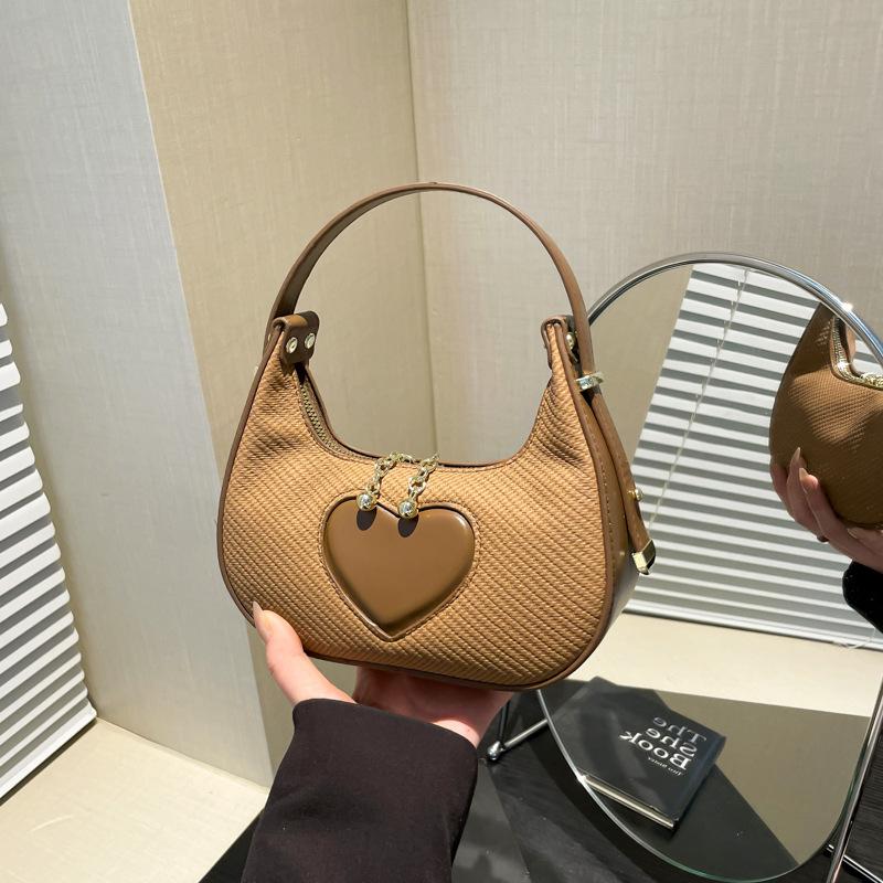 

Fashion single shoulder armpit bag 2025 new Korean version portable single shoulder dumpling bag solid color simple love women s bag чорний
