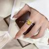 Elegant Yellow Diamond Ring with Square Pink Open Design