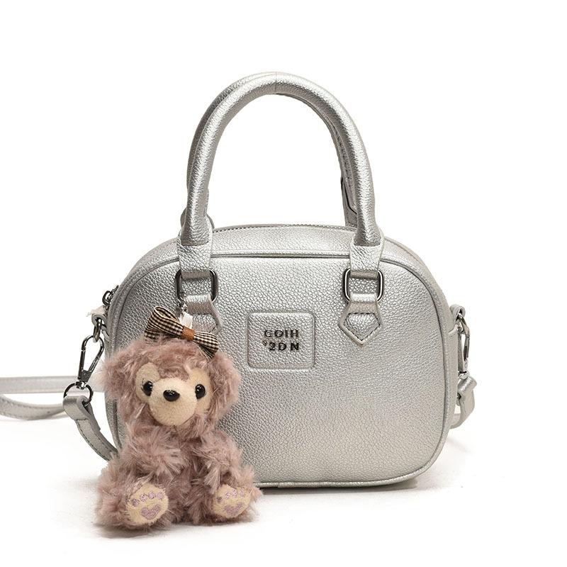 Early Spring Hot Sale French Niche Fashionable Portable Bowling Bag Solid Color Versatile Temperament Advanced Sense Messenger Women's Bag