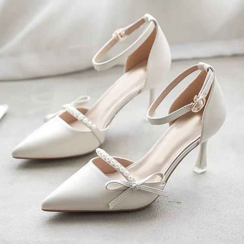 French bow bag head sandals women's summer new one-word with hollow high heels women's thin heel pointed single shoes