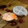 With Flower Decorations Leaf - Shaped Candle Mold and A Handmade Candle In Soft Green Ideal for Creating Romantic Ambiance