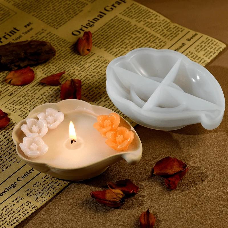 With Flower Decorations Leaf - Shaped Candle Mold and A Handmade Candle In Soft Green Ideal for Creating Romantic Ambiance