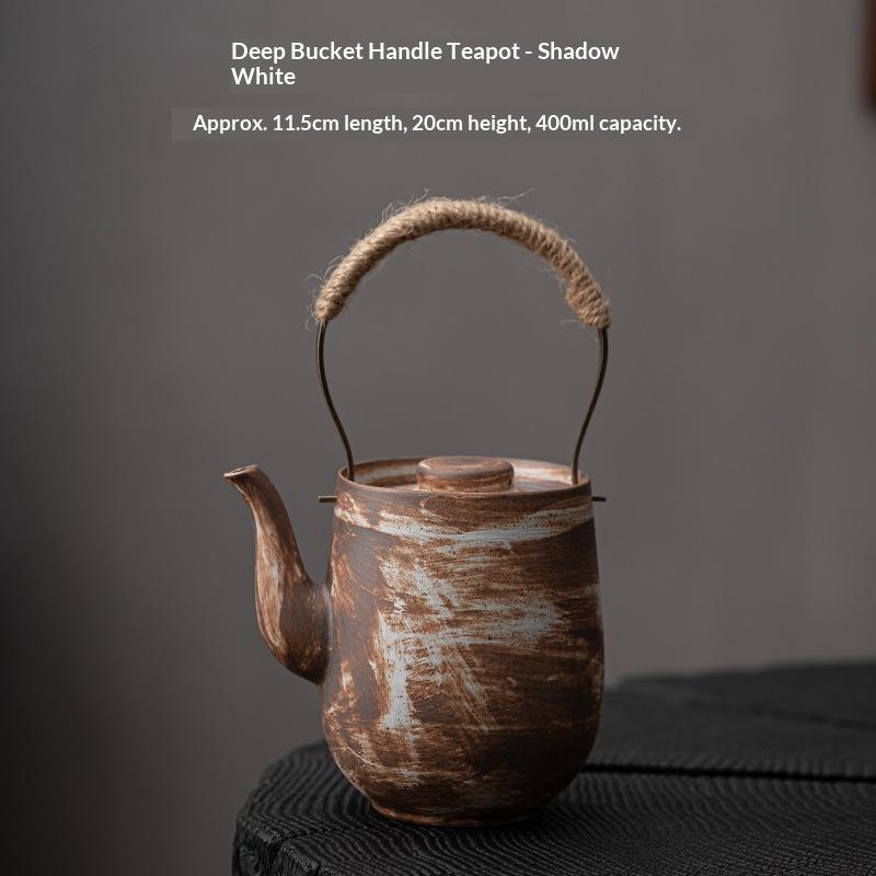 

Handmade Coarse Pottery Teapot with Handle Antique Ball Hole Tea Filter Ceramic Teapot Single Tea Brewing Device Tea Infuser
