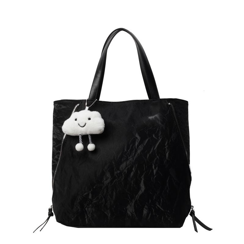 

Корейская версия повседневной сумки-тоут, высококачественная вместительная женская сумка 2024 года, новый простой и универсальный рюкзак чёрный