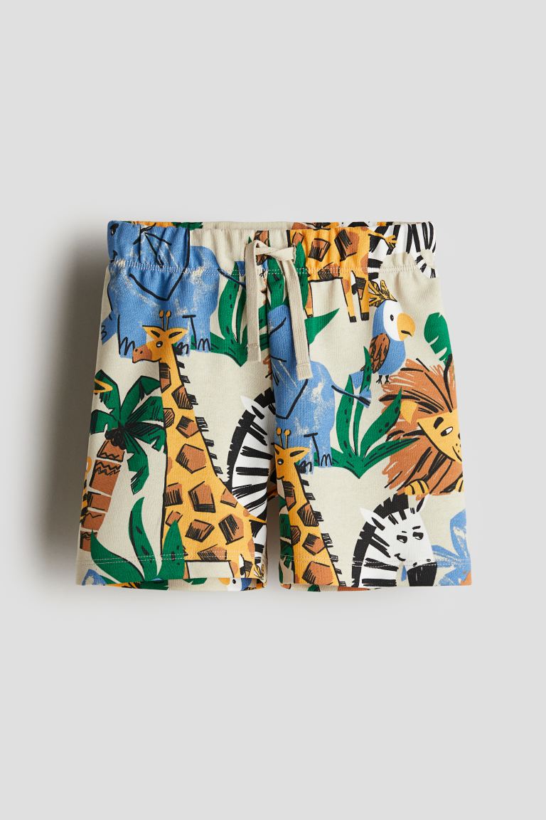 

Спортивные шорты с принтом HM светло-бежевого цвета с изображением животных