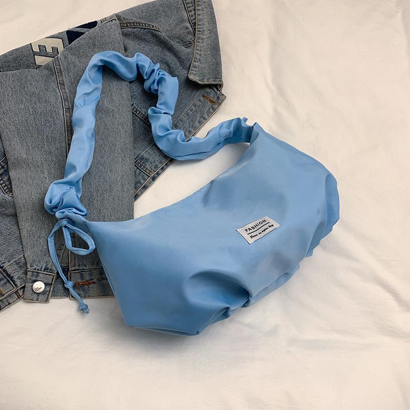 

Niche baguette bag women s 2025 spring and summer new high-end shoulder messenger bag pleated cloud underarm bag синий
