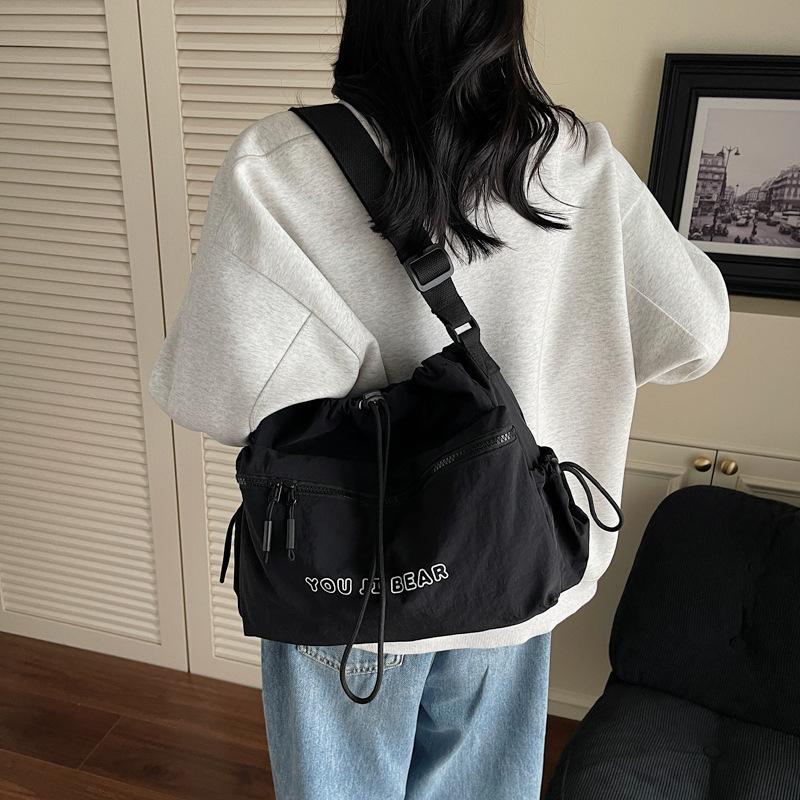 Large capacity casual tote canvas bag women's light drawstring bucket bag travel bag simple commuter shoulder crossbody bag
