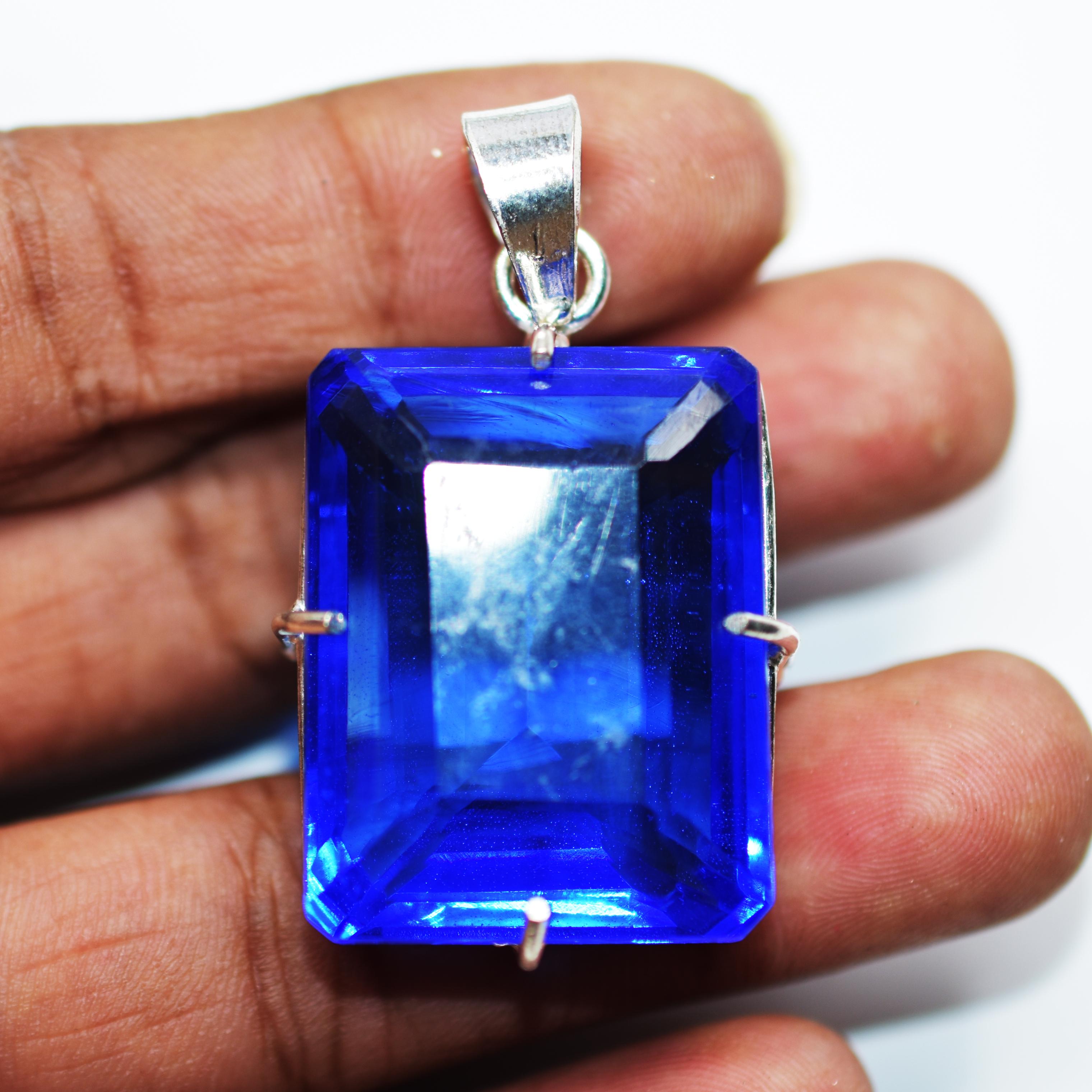 

Natural Topaz 925 Sterling Silver Blue Pendant Emerald 109 Ct Gemstone CERTIFIED MY-337-K 31.9 mm approx синій