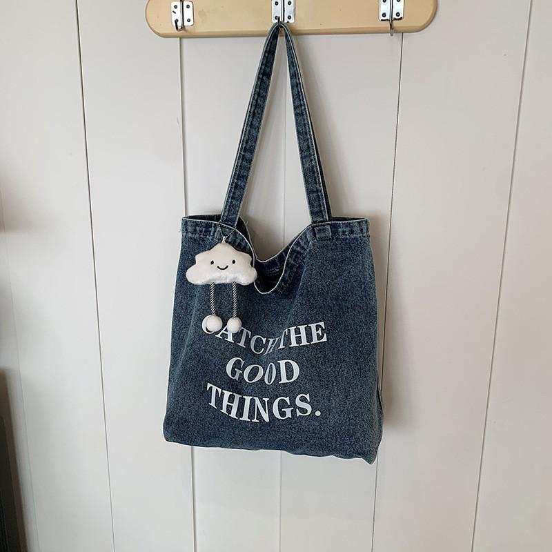 Fashionable Medium Sized Denim Tote Bag With Unique Stitching Details For Everyday Use