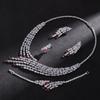 Luxus Rubinpendant-Ketten- und Ohrring-Set - 4-teiliges Hochzeits- und Abendaccessoire-Set