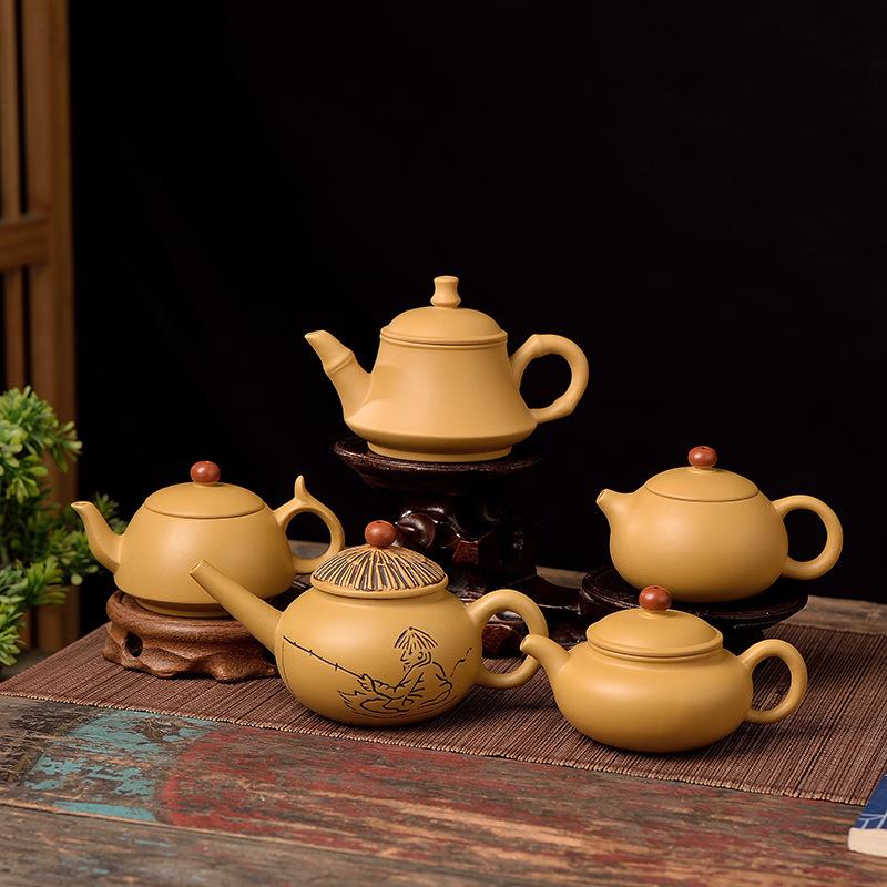 Handmade gold cinnabar, purple sand tea set, tea maker, household kung fu teapot, official hat, fisherman standing upside down and breaking water