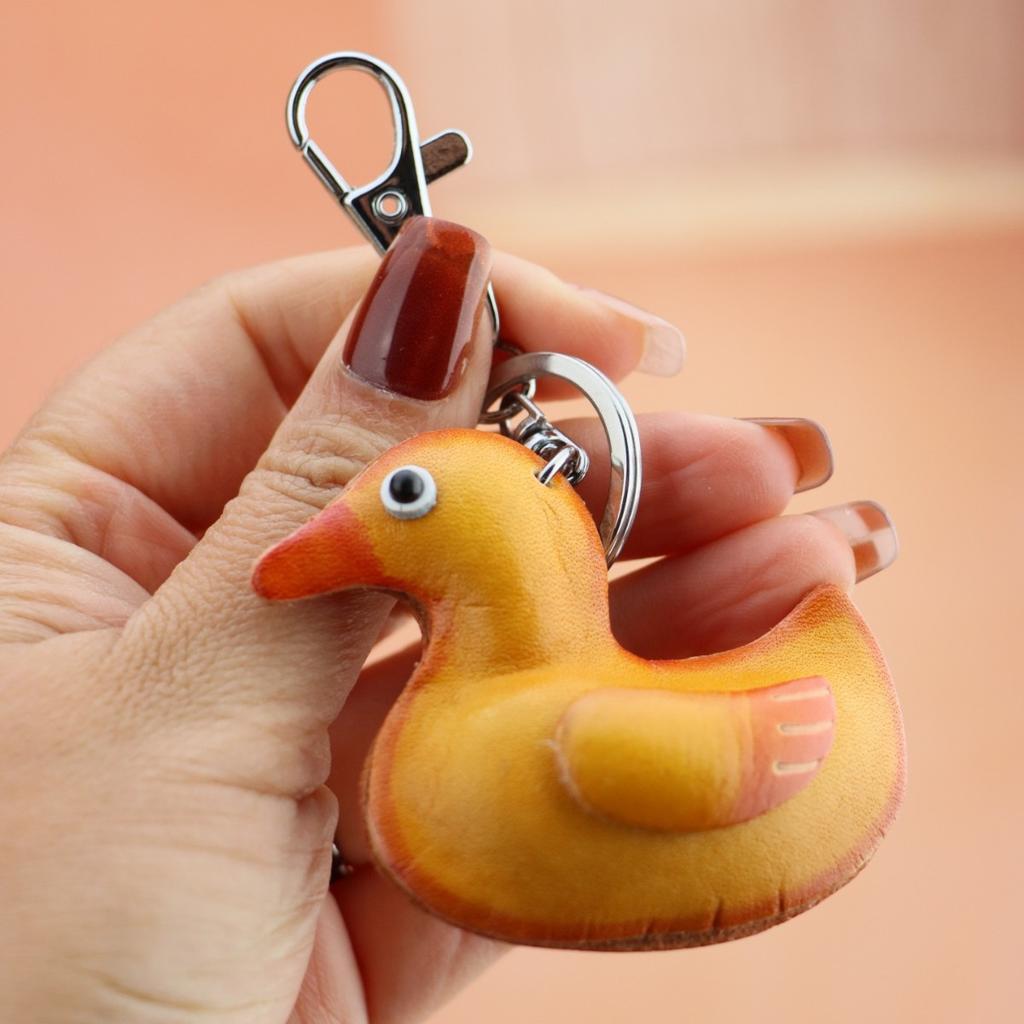 First Layer Cowhide Small Yellow Duck Keychain Pendant, Locomotive Car Key Chain Accessories, Bag Pendant, Cute Little Gift.