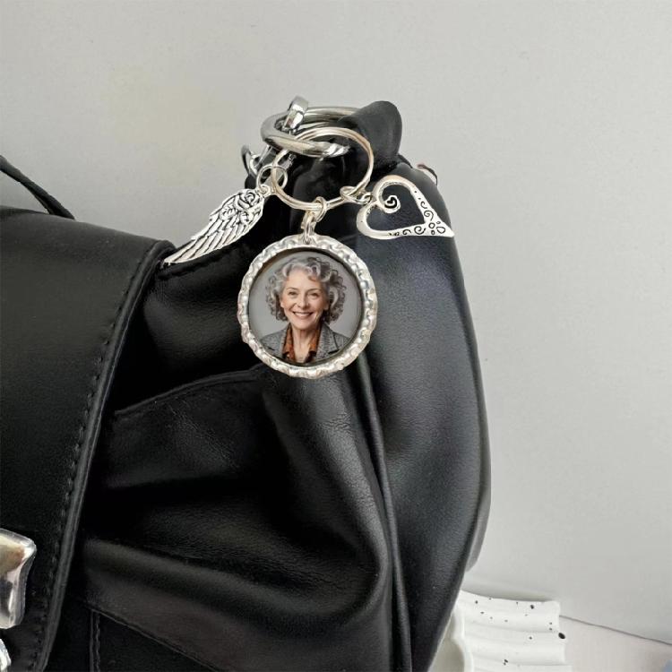 Artistic Wing Shape Keychain Custom Picture Insert Feature Stainless Steel Construction for Graduation