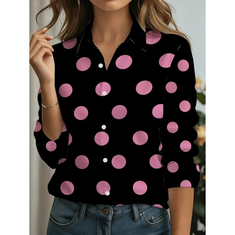 Camicia a maniche lunghe con stampa a pois bianchi su sfondo nero e rosa, che persegue uno stile fashion e retrò, con un accattivante design a pois rosa all-over