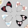 Themed Party Ear Headband with Soft Plush Texture, Ribbon Detail and Hanging Charm for Costume Styling and Photos
