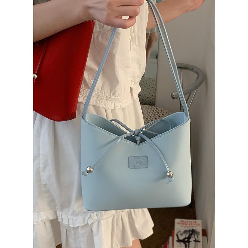 

Niche women s underarm commuter bag 2025 new summer simple bucket bag versatile shoulder bag one piece dropship синий