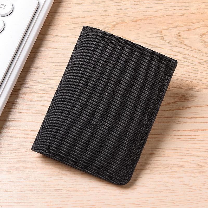 Men's Ultra-Thin Canvas & Leather Wallet: Multi-Card, Slim, Folding Design for Students & Youth.
