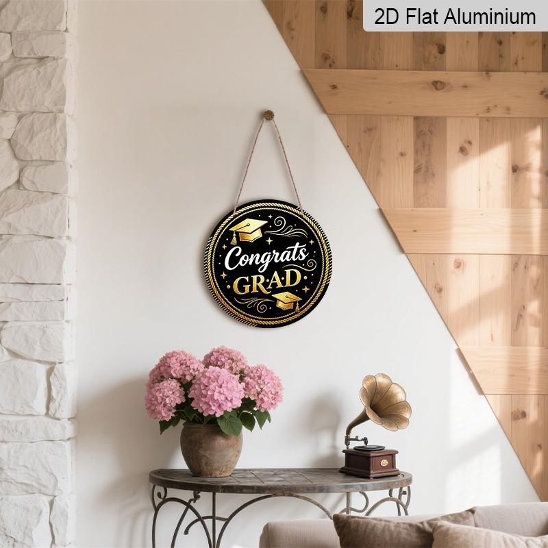 2D Flat Aluminum Graduation-themed Wall Decoration Available in Multiple Sizes Features A Black and Gold Minimalist Graduation Cap Design Making It A