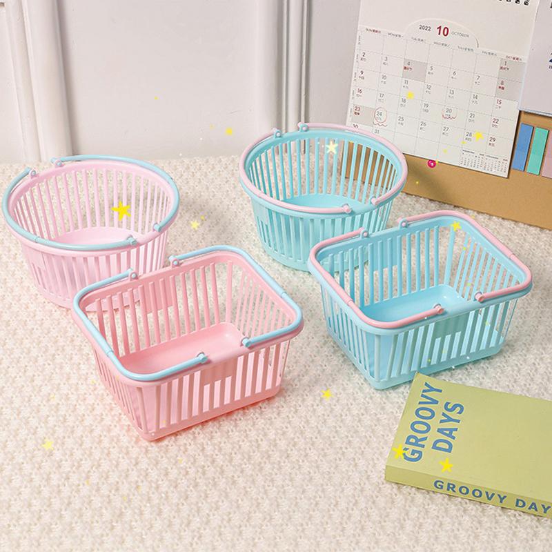 Neuer Kunststoffkorb-Organizer Tragbare Einkaufs-Aufbewahrungsbox Desktop-Kleinteile Spielzeug Obst Schreibwaren-Organizer Heimaufbewahrungskörbe
