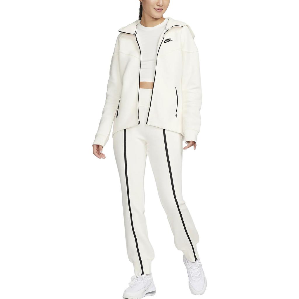 Nike Pantaloni Sportivi in Maglia a Righe Vita Alta Vestibilità Slim Fit Zip ai Polsini Donna Fondo Avorio FN7130-110