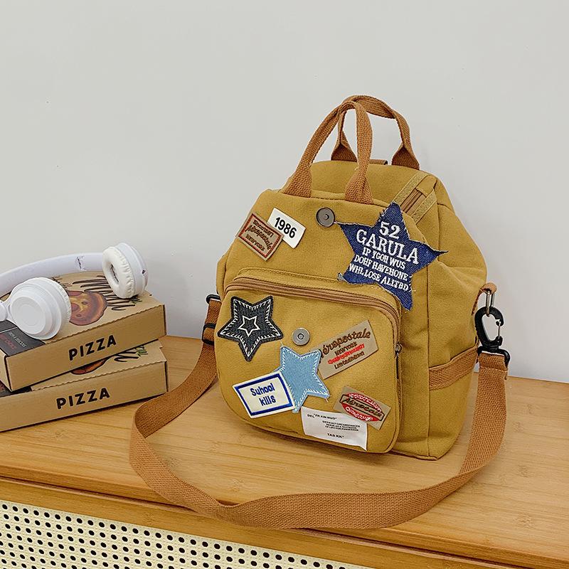 

Retro casual canvas bag women s new shoulder messenger bag multi-functional backpack backpack коричневый