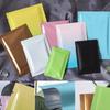 Papel de embrulho – Sacos de embalagem e organza