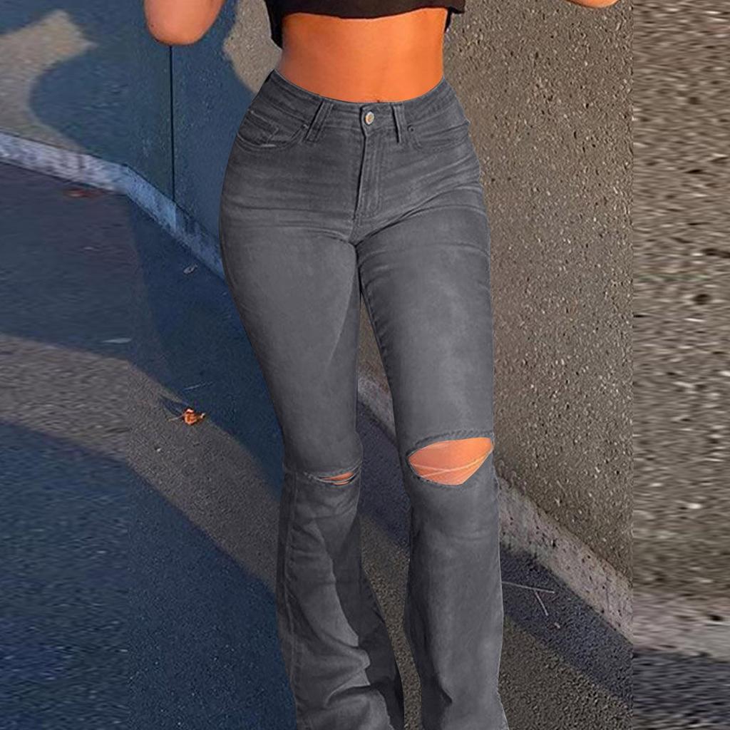 Damen Jeanshose mit weitem Bein und Löchern sowie leicht ausgestelltem Bein