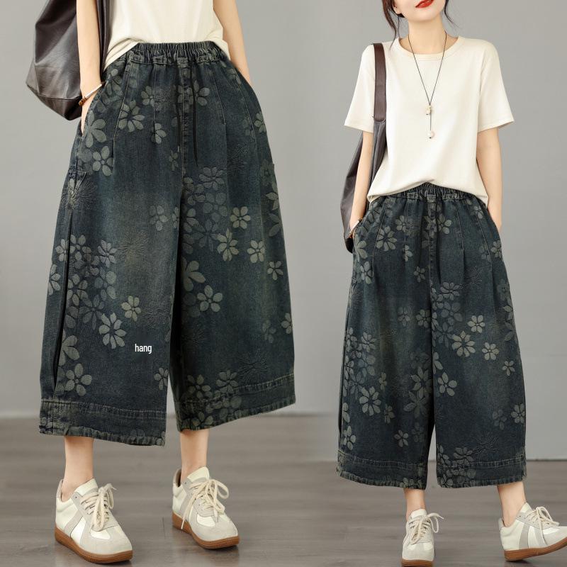 Pantaloni a zampa crop in denim jacquard floreale taglie forti