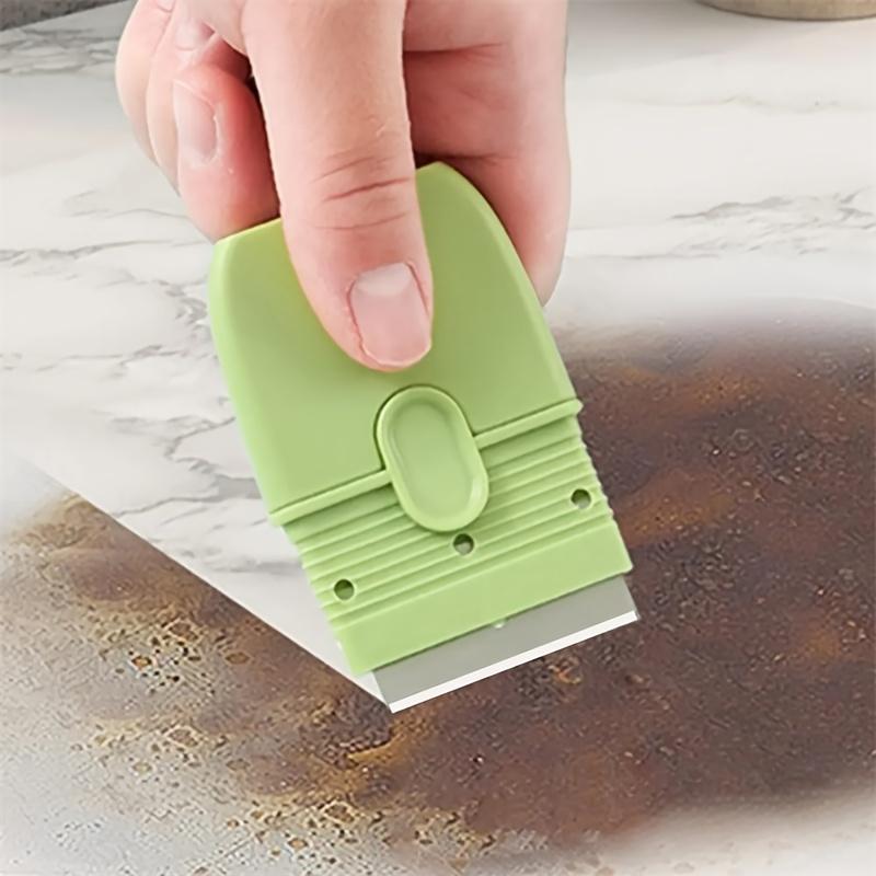 A Mini Scraper with A Protective Cover, A Portable Dual-Headed Ceramic Wall Cleaner, A Tile Scraper, and A Multifunctional Cleaning Tool.