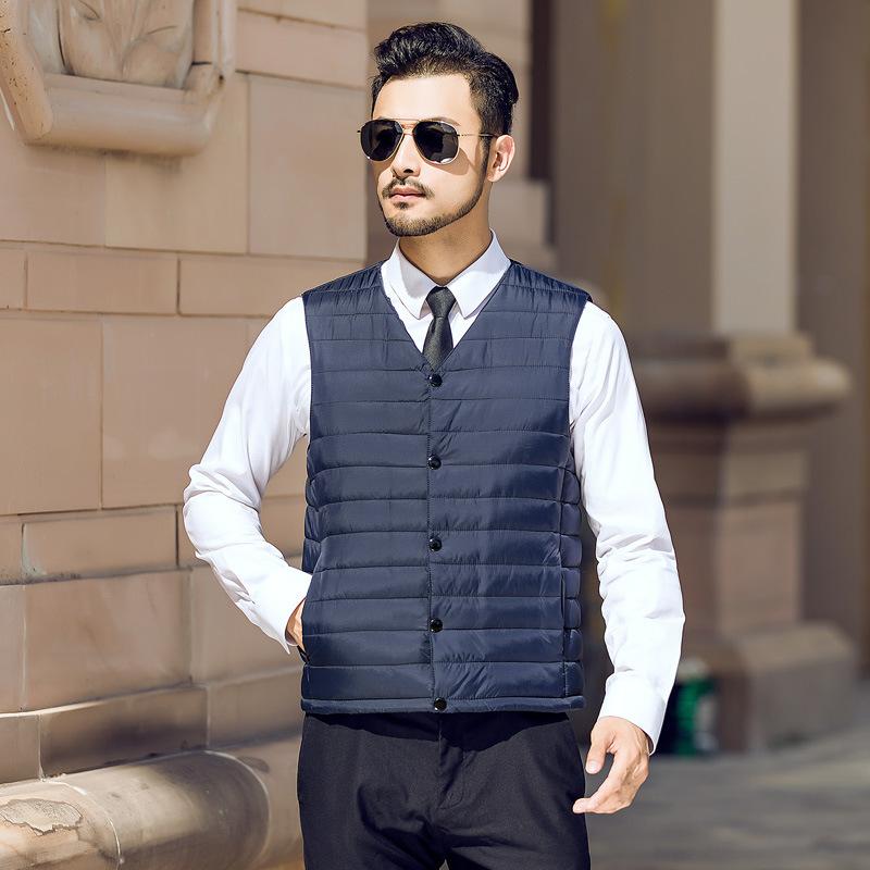 

Men s new vest wears a slim-fitting cold-proof and warm vest without a collar, casual and light vest, middle-aged and elderly XXXL-150-85 kg Темно-синій
