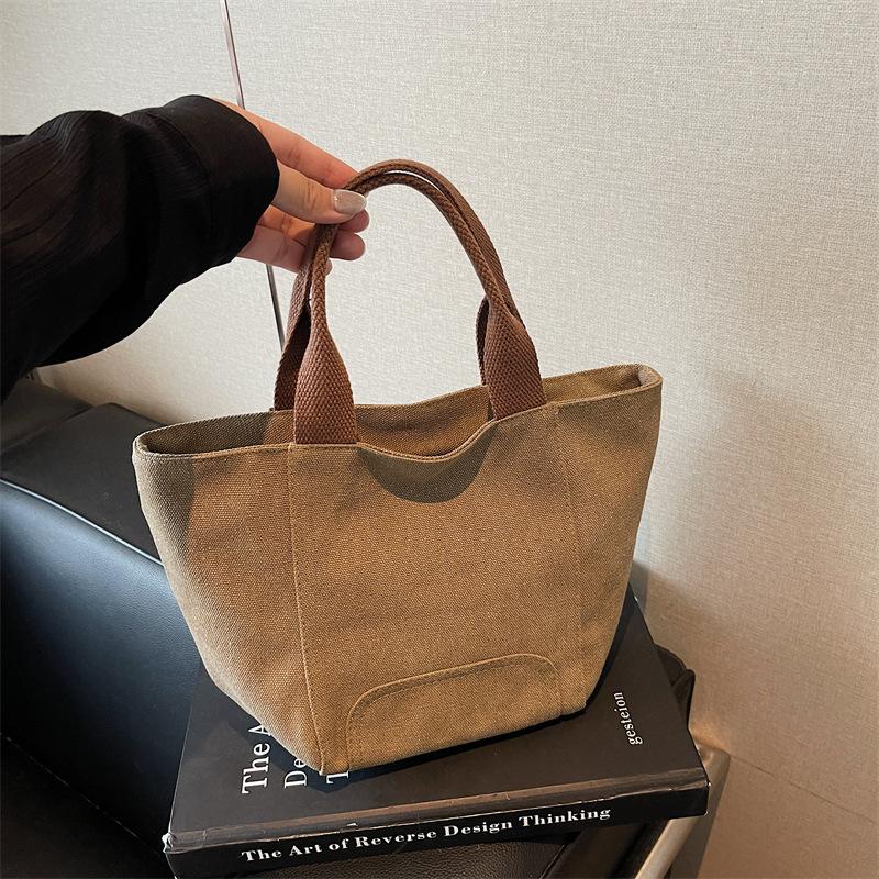 

Simple fashion trend versatile daily commute outdoor sports travel texture lightweight creative large capacity canvas bag коричневый