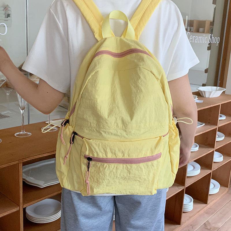 Schoolbag Ultra Light Portable Backpack Commuter Wash Pleated Sense Backpack Leisure Large Capacity Versatile School Bag Women's Travel Bag Tide