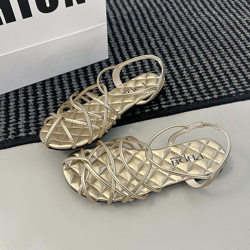 French Retro Ribbon Woven Hollow Open-toed Sandals Women's Summer 2025 New Versatile Flat-soled Roman Sandals