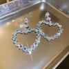 Silver Needle Exaggerated Heart Earrings with Hollow Diamond Design - Luxury European & American Style for Women