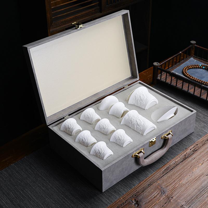 Embossed tea set, simple vegetarian-fired suet jade porcelain Kung Fu tea set, gift box set, six cups for office home gifts