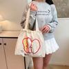 Summer New Korean Version Drawstring Nylon Shoulder Bag Ins Light Red and White Contrasting Color Apple Slice Commuter Handbag
