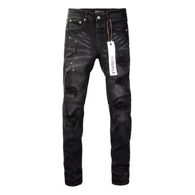Exclusivo para marcas americanas de moda, nuevas manchas de pintura negra, salpicaduras de tinta, grafiti, parches de diamantes calientes en la rodilla, jeans ajustados, hombres