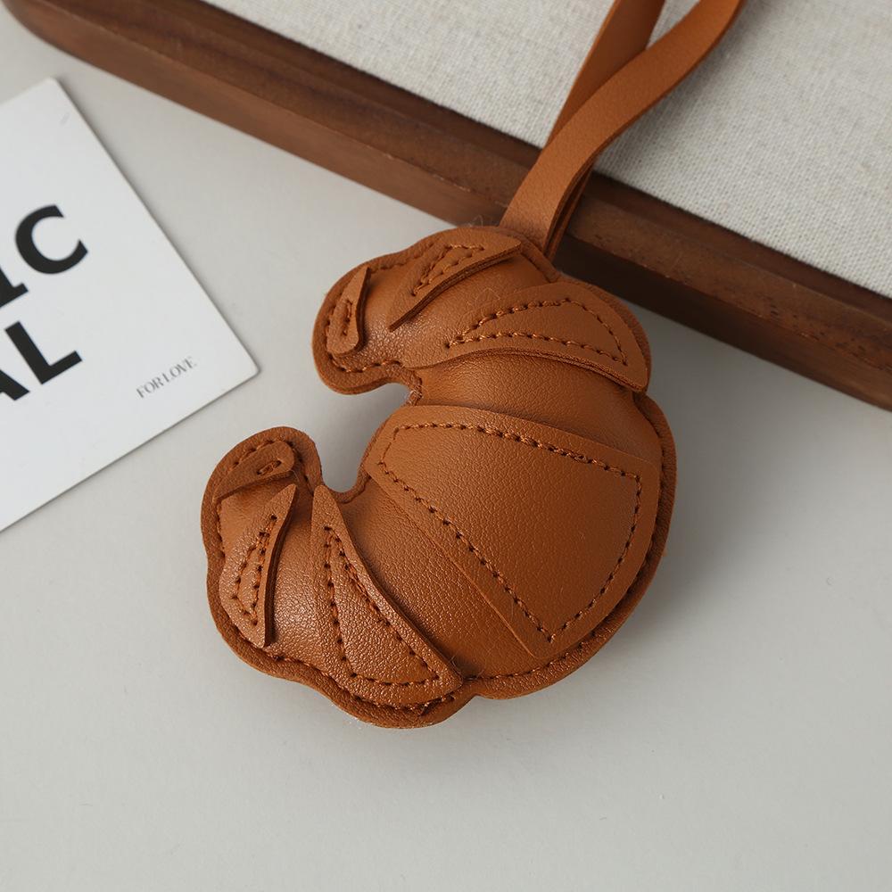 Croissant pendant creative simple bag keychain luggage pendant PU leather leather multi-layer patch pendant