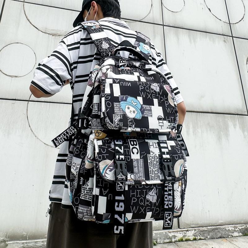 New fashion student schoolbag animation printing trend fashion backpack men and women large capacity simple graffiti backpack