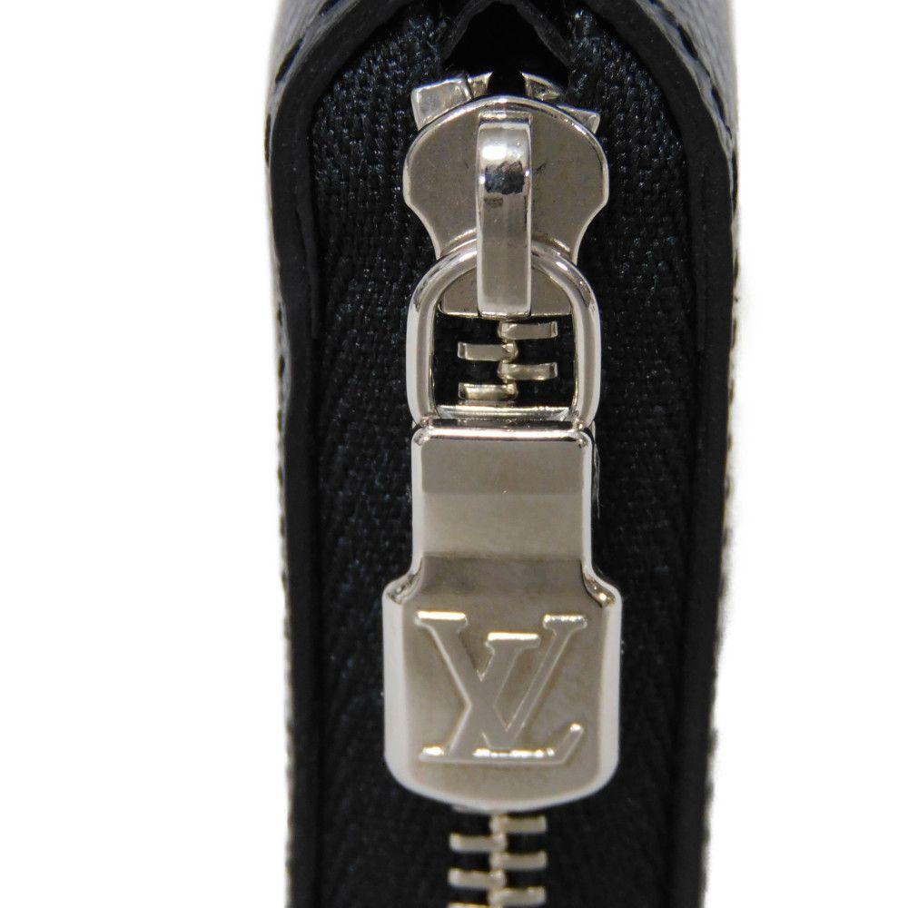 Used 12564 Zippy Coin Purse M30511 7943 New LV Logo Embossed Black Zip Around Taiga Noir Men's from Japan AUTHENTIC