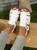 Fashion New fashionable belt-buckle flat-bottomed hollowed-out sandals and retro solid-color beach flip-flops