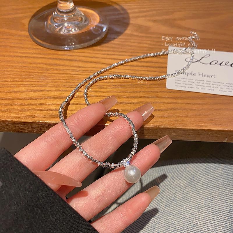 

Роскошное жемчужное ожерелье с серебряными акцентами – Модная, универсальная ключичная цепочка для элегантности и стиля