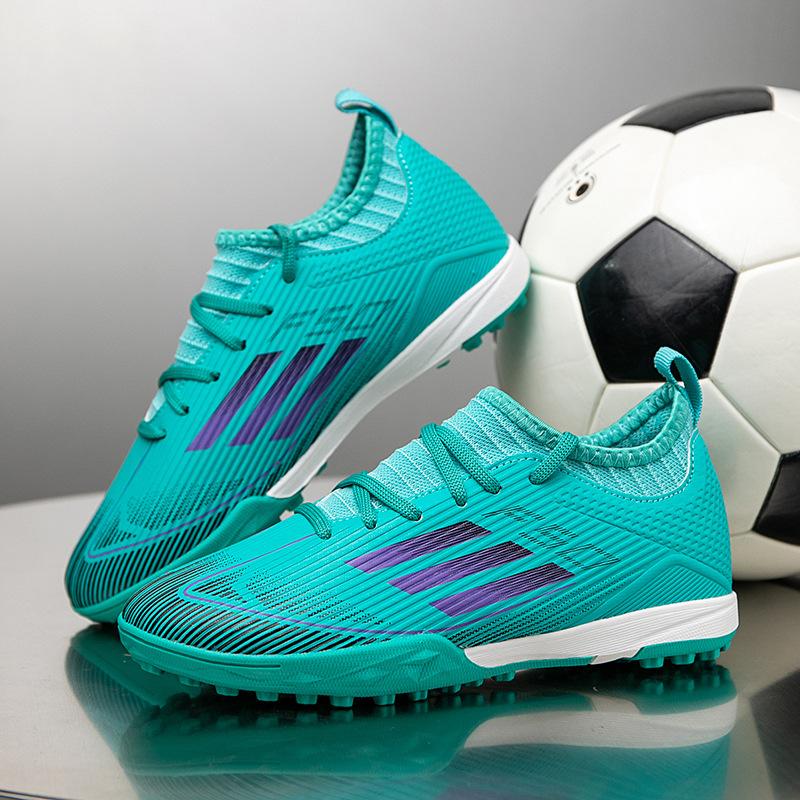 2025 new children's football shoes boys and girls broken nails T people grass students game training football shoes 31-40