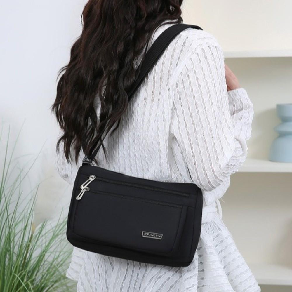 Sac bandoulière multicouche à plusieurs compartiments Sac léger en nylon pour femmes d'âge moyen Trajet