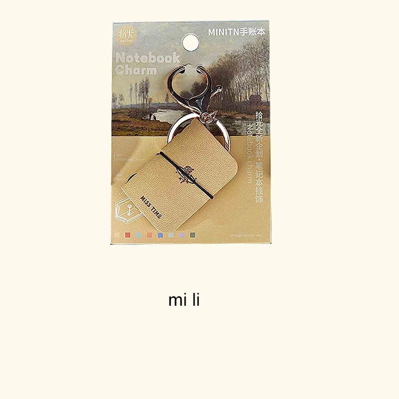 

JIANWU Monet Impression Series Vintage Material Collage Mini PU Handbook Keychain Creative Journal Student Supplies Stationery