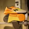 Reebok Nano X5 'Kreideschwarz Elektrisches Bernstein' Sneaker 100209367