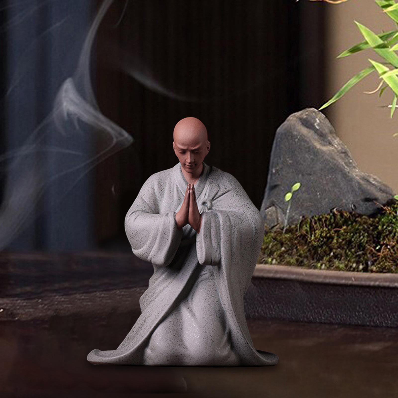 

Collection of sculptures of Buddhist monk figures in ceramic clay,