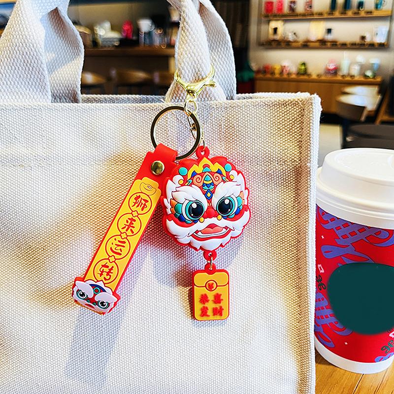 

Силіконовий брелок із зображенням танцювальної голови лева. Милий китайський стиль. Танець лева. Автомобіль, брелок, сумка, кулон, креативний подарунок жовтий