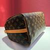 [Pre-Owned] Speedy 30 Iconic Design Rolled Handle Engraved Lock Detachable Adjustable Shoulder Strap Coated Canvas Smooth Leather - Very Good #1DZ6GFI